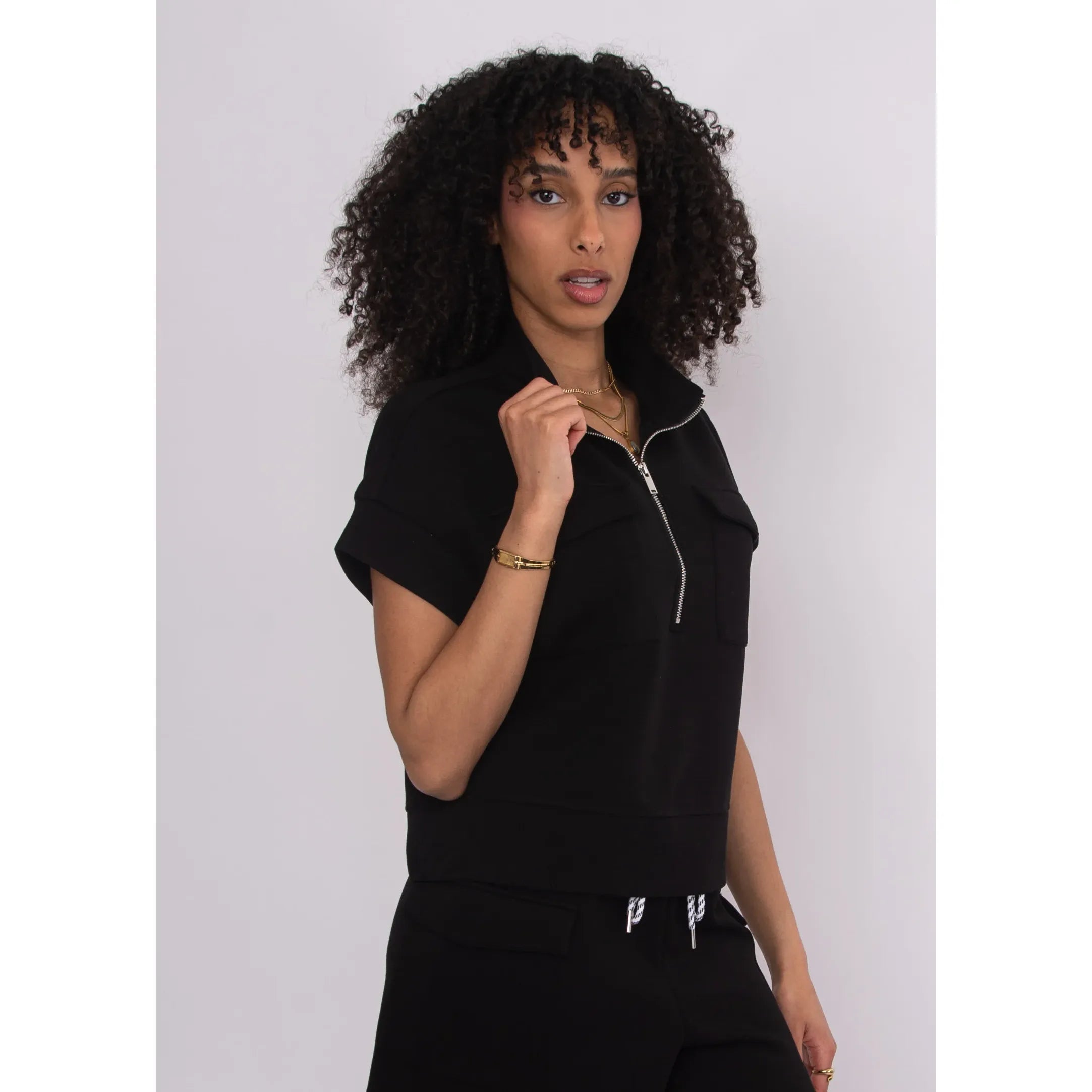 dua-1-2-zip-short-sleeve-top-black-2.jpg